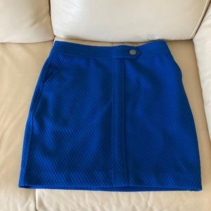 Incredibly classy Banana Republic blue skirt, hits about 2 inches above knee.